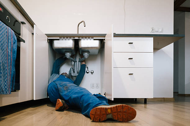 Professional Emergency Plumber technician working in Bessemer, MI